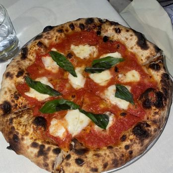 ZZ and Simone’s signature dishes Wood-Fired Pizza, Handmade Pastas, Roasted Chicken, Salade Niçoise